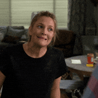 TV gif. Drew Barrymore as Sheila in Santa Clarita Diet. She smirks, shakes her head, and mouths the word as it appears, Oopsie.
