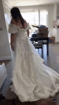 Girlfriend Stuns Boyfriend With Thrift Shop Wedding Dress in Not-So-Subtle Hint
