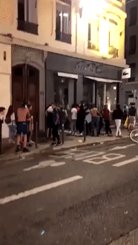 Looters Ransack Sports Shop in Lyon After France World Cup Victory