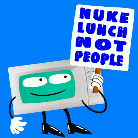 Digital art gif. Cartoon microwave with a smiling face holds a picket sign that reads, in large blue text, "Nuke lunch, not people."