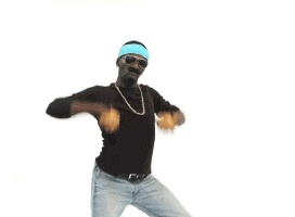 Video gif. Man wearing dark sunglasses dances, wiggling and rotating his body smoothly around. He has a serious stank face on as he claps and wiggles his arms as he dances.