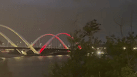 Lightning Flashes Over Red, White and Blue Bridge in Washington During Fourth of July Weekend