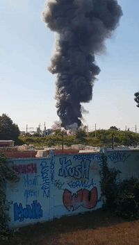 Black Plume of Smoke Billows From Fire Near Paris Airport