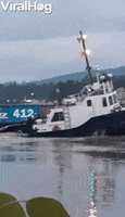 Tugboat Manages To Avoid Capsizing GIF by ViralHog