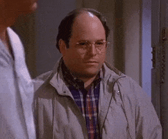 Seinfeld gif. Actor Jason Alexander as George Costanza in Seinfeld awkwardly glances around the room before slowly backing out of the apartment and closing the door behind him. 