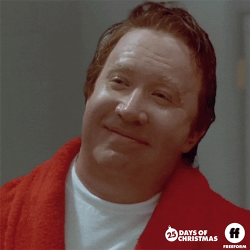 Movie gif. Tim Allen as Scott Calvin in The Santa Clause looks at himself in the mirror and watches in dismay as his brown hair and shaven face slowly transform before his eyes. All his hair, including his eyebrows, turns pure white, and a thick, white beard grows on his face. 