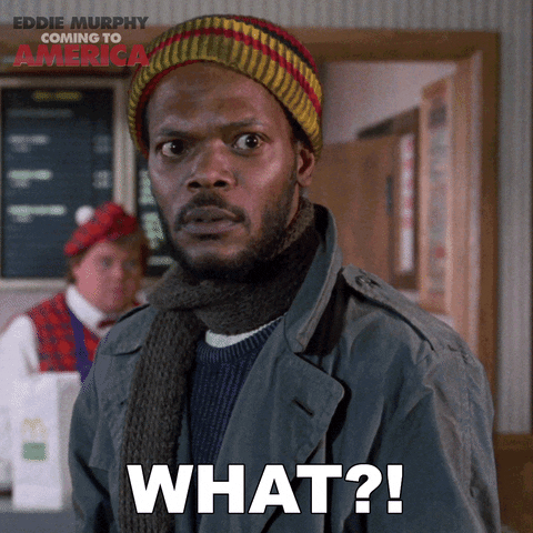 Movie gif. Samuel L. Jackson as the "Hold-Up Man" in Coming to America says "What?" with a concerned look on his face.