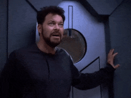 TV gif. Jonathan Frakes as William in Star Trek stands with his back to the wall and screams out for help. He seems to realize no help is coming and sinks to a crouch in defeat before weakly repeating his plea. Text, "Help me!"
