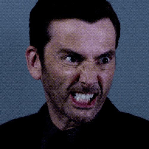 TV gif. David Tennant as Kilgrave on Jessica Jones has an intense, angry expression on his face. He grits his teeth tightly as he says, “Do it!”