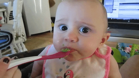 Baby eating yucky food