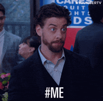TV gif. Peter Hermann as Charles on the show Younger points to himself with both hands, saying “Hashtag Me”. He has wide eyes that strongly stare at the other person off screen, like he’s asking to be challenged on what he knows is right. 