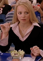 Movie gif. Rachel Mcadams as Regina George in Mean Girls sits at a lunch table with a tray with just a plain salad in front of her. She holds her hands up and then flops them down as she rolls her eyes. 