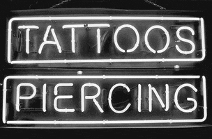 tattoo piercing GIF