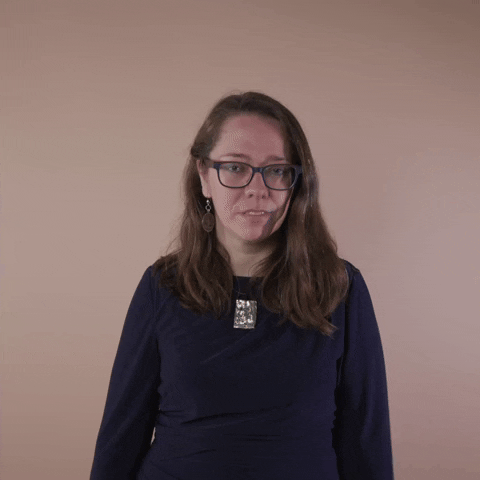 Reaction gif. A Disabled Latina woman with brown wavy hair and glasses dramatically face palms with a sigh, pushing her head so far back her neck arches and her face disappears upward.