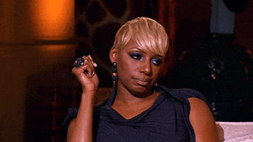 Celebrity gif. NeNe Leakes rolls her eyes slowly and emphatically.