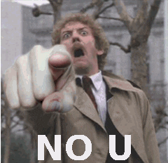 Video gif. A man stands above us and points his finger, looking shocked and angry. Text, “No, U.”
