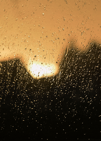 Rain Sunset GIF by Head Like an Orange