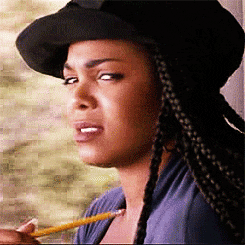 Movie gif. Janet Jackson as Justice in Poetic Justice looks over and side eyes someone, judging them. She taps her collar bone with the eraser end of her pencil.