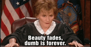TV gif. Once again, Judge Judy is fed up and we're about to get an earful. Text, "Beauty fades, dumb is forever."
