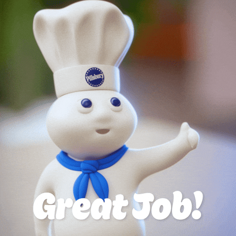 Sponsored gif. The Pillsbury Doughboy, in his iconic blue scarf and Pillsbury chef hat, gives two thumbs up. Text: "Great Job!"