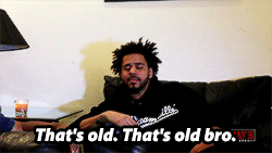 Celebrity gif. Looking annoyed, Rapper Jermaine Cole says, “That’s old. That’s old bro.”