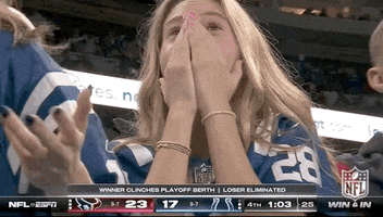 Sports gif. A woman in a Colts jersey covers her nose and mouth with both hands and stares at the camera in shock and disappointment.