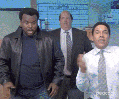 The Office gif. (From left to right) Darryl, Kevin and Oscar dance around wildly in celebration.
