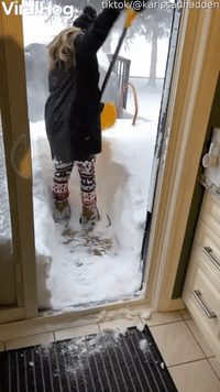 Woman Slips While Shoveling Snow