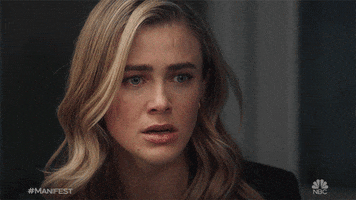 TV gif. Actor Melissa Roxburgh as Michaela Stone on Manifest reacts in stunned surprise and looks away. 