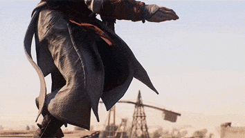 Video game gif. From "Assassin's Creed Mirage," a character leaps in slow motion from a balcony and we cut to a dramatic view looking up at him soaring through the air, backlit by the sun, as a falcon flies up from below.