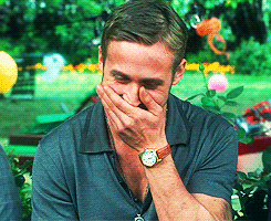 Movie gif. Ryan Gosling as Jacob in Crazy Stupid Love, covers his mouth as his body shakes in laughter.