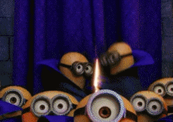 Despicable Me gif. Group of minions stare out at us as two in the back pull open a blue curtain; light pours in and two minions hold up a cake topped with the numbers 357, below a banner that reads "happy birthday."