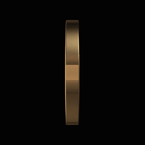 a gold coin is spinning on a black background .