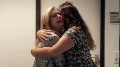 Awkward Hug GIF - Find & Share on GIPHY
