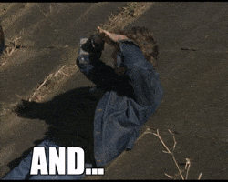 Celebrity gif. Musician Paul McCartney stretches out his arms and lays back on the ground. Text, "And...relax!"