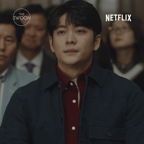 TV gif. Kang Tae-oh as Lee Jun oh on Extraordinary Attorney Woo sits in an audience of people. He leans back and facepalms out of second hand embarrassment. He slides down in his seat and crosses his arms. 