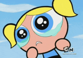 Cartoon gif. Bubbles from The Powerpuff Girls has tears wobbling in her eyes as she's about to break out into a cry.