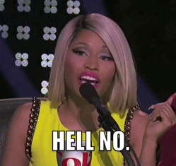 Celebrity gif. Annoyed and angry, Nicki Minaj shakes her head in disagreement and says, “Hell no.”