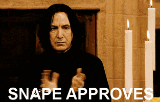 Movie gif. Alan Rickman as Professor Snape in Harry Potter looks serious but claps emphatically.
