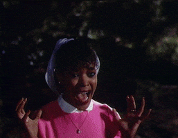 TV gif. Ola Ray as Michael Jackson’s girlfriend in the Thriller video screams in terror, her hands shaking in fear.