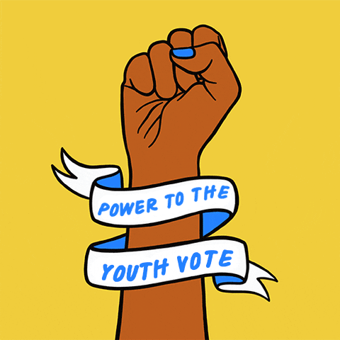 Illustrated gif. Young woman's fist raised in solidarity against a yellow background, emphasized with action marks, a banner garnishing the forearm reads, "Power to the youth vote!"