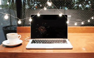TruffleTalent fireworks laptop designers remoteworking GIF