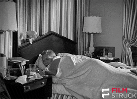 in bed sleeping GIF by FilmStruck