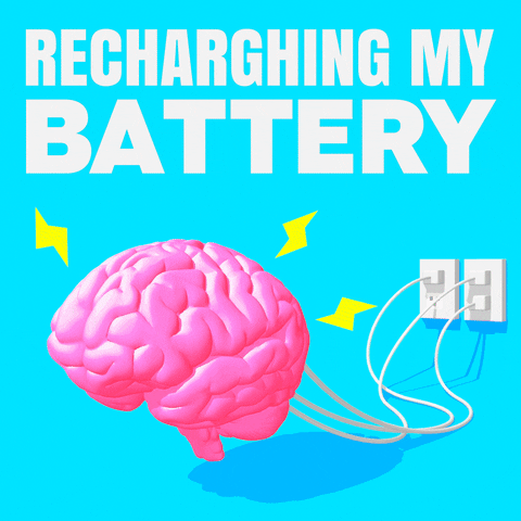 Digital art gif. Cartoon animation of a throbbing brain is plugged into two different outlets in the wall below yellow and white text that reads, "Recharging my battery," everything against a blue background.