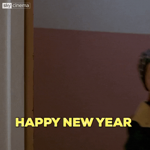 Movie gif. In his trademark winter gear, Macaulay Culkin as Kevin  from Home Alone enters the room and scrunches his face to speak to us as a gruff alternate persona. He smiles, raises his eyebrows, and quickly exits. Text, "Happy New Year."