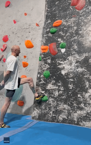 No Hands Rock Climbing GIF by Storyful