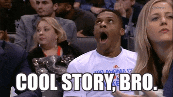 Sports gif. NBA player Russell Westbrook yawns in the stands. Text, "Cool story, bro."