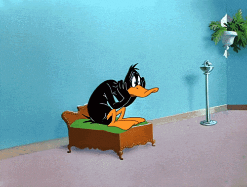daffy duck waiting GIF