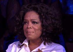 Celebrity gif. Oprah holds back tears, blinking hard and nodding with a tightened mouth.