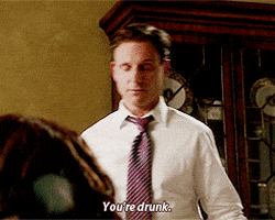TV gif. Tony Goldwyn as Fitzgerald in Scandal. He looks down and leans away as he says, "You're drunk."